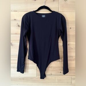 Women’s black bodysuit.
